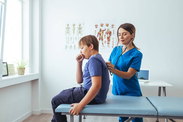 Scared boy with respiratory issues at doctor appointment